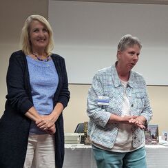 Author Darci Hannah is introduced at a Friends' event