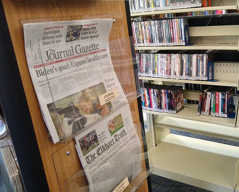 Newspapers on display at the Syracuse Public Library.