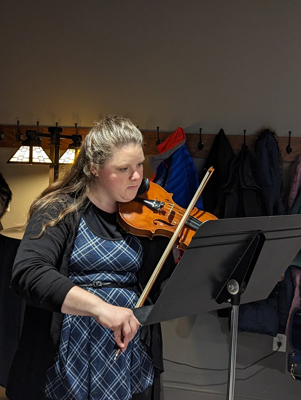 SPL's Rebekah Sceniak plays her violin.
